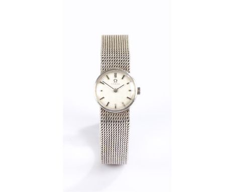 Omega 9 carat white gold cased ladies wristwatch, the signed silver dial with baton numerals, manual wound, the case 19mm dia