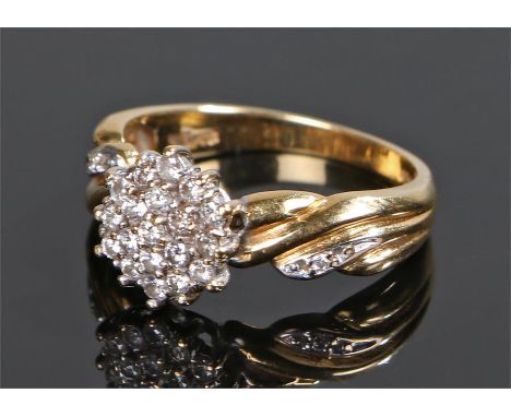 18 carat gold diamond cluster ring, the head set with round cut diamonds totalling 0.33 carats, ring size O