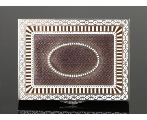 Austrian white metal and enamel snuff box, the exterior with brown and white enamel decoration, leaf cast thumb piece, gilt i