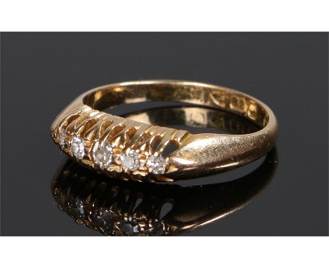 18 carat gold diamond set ring, with a row of five round cut diamonds, ring size J