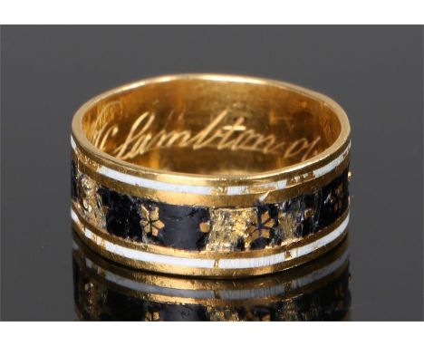 George III 18 carat gold and enamel mourning ring, with a black enamel band with gold flowers, text internally dated 1797, AF