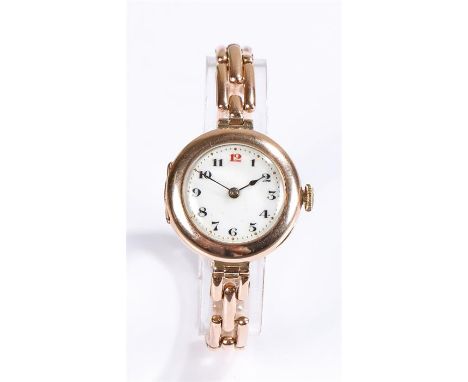 Rolex 9ct gold cased ladies wristwatch, the white enamelled dial with Arabic numerals surrounded by an outer track of gilt an