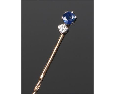 Sapphire and diamond stick pin, in a gold coloured metal setting