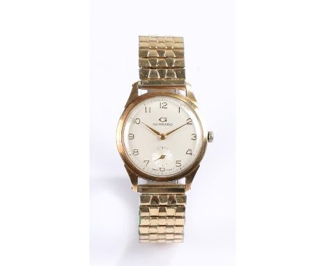 Garrard 9 carat gold gentleman's wristwatch, the white dial with gilt Arabic numerals, subsidiary seconds dial to the lower c
