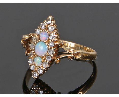 15 carat gold opal and diamond set ring, the navette head set with three opals and a diamond surround, ring size M