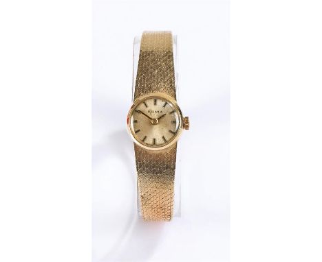 Rodania 9 carat gold ladies wristwatch, the signed champagne dial with baton numerals, manual wound, the case 16mm diameter, 