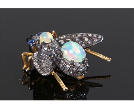 Sapphire opal and diamond set insect brooch, with opals to the bodies with diamond wings and sapphire eyes, 32mm long