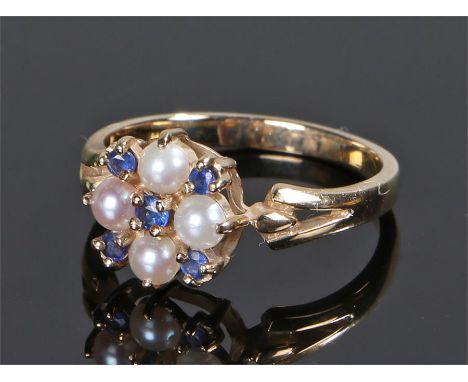 9 carat gold pearl and sapphire set ring, with five sapphires and four pearls to the head, ring size Q