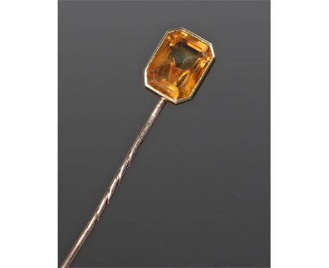 Citrine stick pin, with an emerald cut citrine above a pin