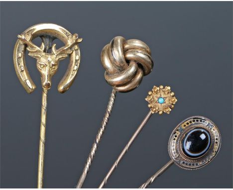 Collection of stick pins, to include a banded agate example, a stag and shoe, a knot and a star example, (4)