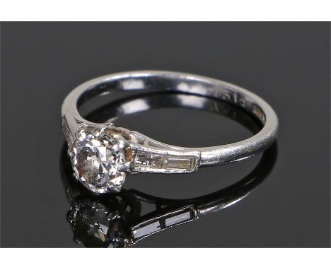 Platinum and diamond solitaire ring, the round cut diamond at approximately 0.57 carat, ring size J