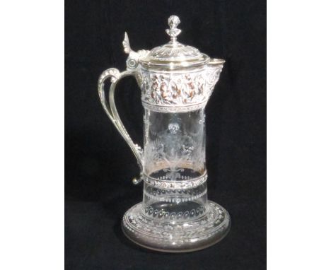 A VICTORIAN ELECTROPLATE MOUNTED CLARET JUG Elkington &amp; Co The glass body etched and cut with putti, swags and foliage, t