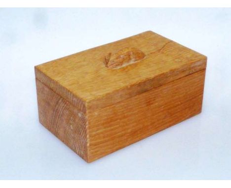 ROBERT THOMPSON OF KILBURN
A MOUSEMAN OAK TRINKET BOX
Of rectangular form with lift-off cover, carved mouse signature.
10cm b