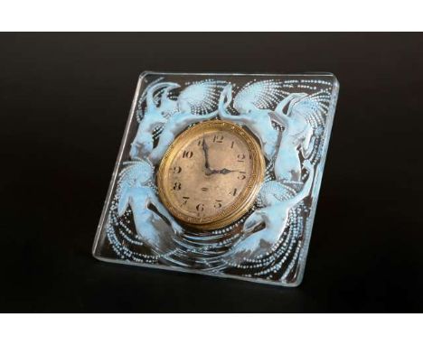 NAIDES
A LALIQUE STRUT CLOCK
Signed R. Lalique France
The frame stained and moulded with sirens with flowing hair in swathes 