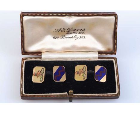 A PAIR OF GOLD AND ENAMEL CUFFLINKS
The rectangular plaques with enamel detailing, one side with blue and red zig-zag detaili