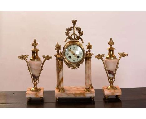 A FRENCH GILT-BRASS MOUNTED THREE-PIECE CLOCK GARNITURE
Late 19th Century
Comprising clock and pair of vases, the clock with 