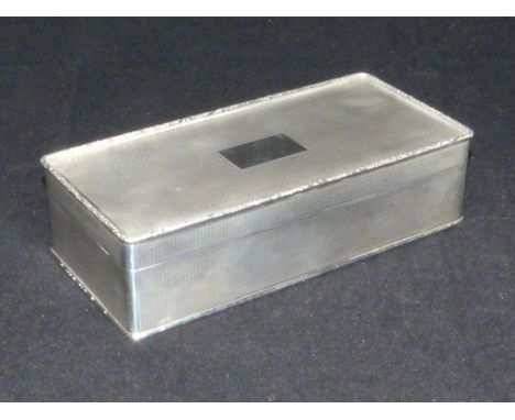 A GEORGE V SILVER JEWELLERY BOX William Base &amp; Sons, Birmingham 1921, retailed by Ogdens Of rectangular form with hinged 