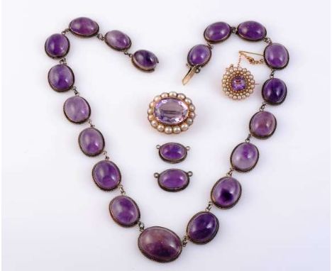 A COLLECTION OF AMETHYST JEWELLERY
To include an amethyst necklace, the nineteen oval cabochon cut graduating amethysts all c