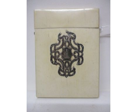 A late 19th century ivory card case of rectangular cushion form having a hinged lid with a button clasp, decorated with a whi