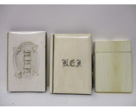 Three late Victorian ivory card cases, each of rectangular form, two of book form with a fanned, compartmented interior, each