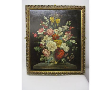 E Vane** - a still life of flowers in a vase on a table, oil on canvas, signed indistinctly lower right, 24 x 20 in a gilt fr