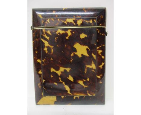 A Victorian white metal string inlaid tortoiseshell card case of rectangular form, the hinged lid having a button clasp, 4 1/