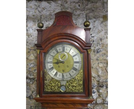 A George III mahogany, London longcase clock, the hood having a pagoda top, over turned columns and arched door with a box ba