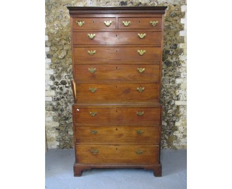 A George III mahogany chest on chest having two short and four graduated long drawers above three graduated long drawers, rai