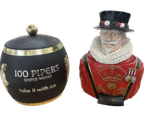 Two advertising items a Beefeater and 100 Pipers Scotch Whisky barrel