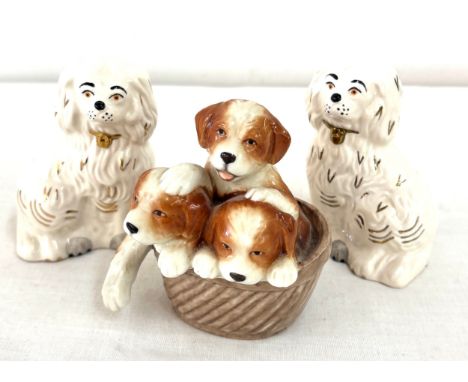 Selection of dog figures includes Royal Doulton, Royal Copenhagen etc