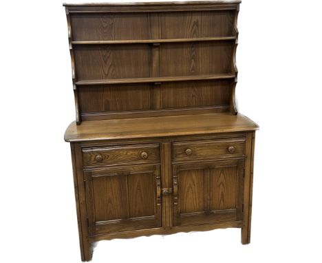 2 Door Ercol dresser measures approximately 48 inches long 19 inches depth height 63 inches
