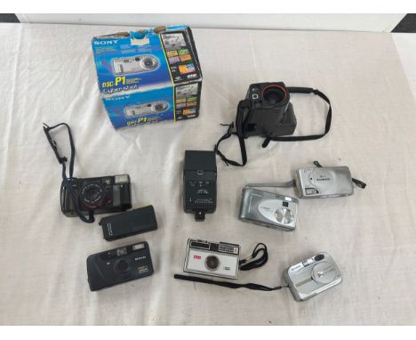 Selection of vintage and later cameras includes Sony, etc