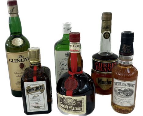 Selection of bottled alcohol includes Masters cherry brandy, Gordons dry gin, Cointreau etc