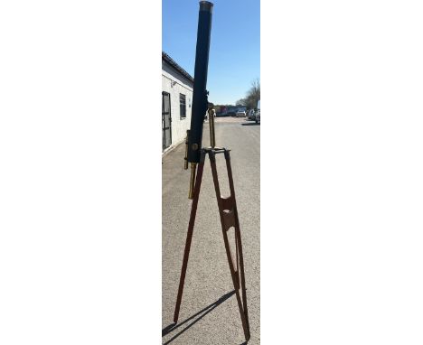 A leather and brass telescope by Broadhurst Clarkson and Co of London, , on wooden tripod, length of telescope is approximate