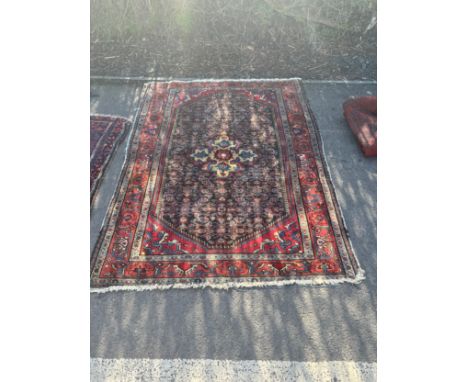 Vintage Persian Rug measures approximately 77 x 56 inches