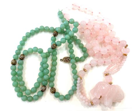 Carved chinese rose quartz and jade beads 