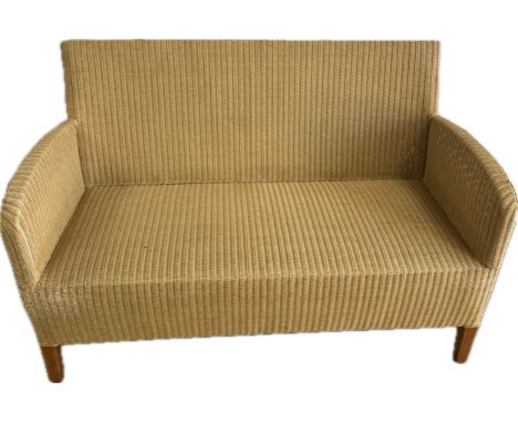 Lloyd Loom sofa measures approximately 51 inches wide x 34 inches tall and 24 deep