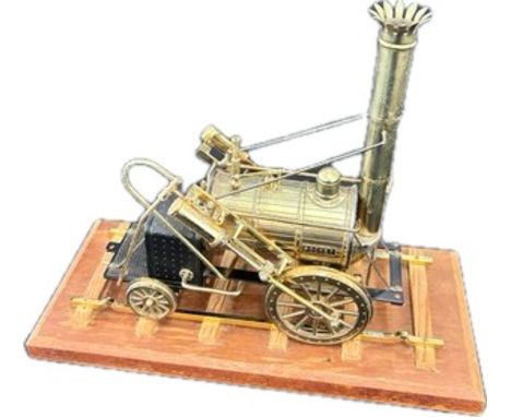 Vintage brass steam train model measures approximately 13 inches wide 11 inches tall