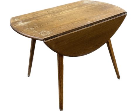 Ercol drop leaf table measures approximately 44 inches diameter 29 inches tall (open)