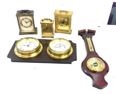 A selection of clocks and a barometer to include three brass carriage clocks etc 