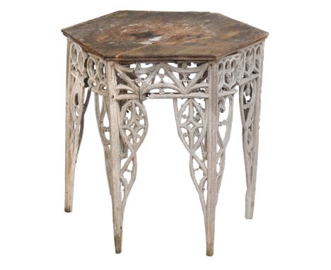  A hexagonal painted beech table in Gothic style,   first quater 19th century and later,  the oak top above tracery frieze an