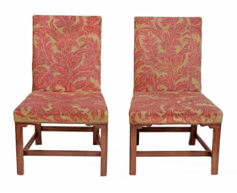  A pair of George III mahogany framed chairs  , circa 1770, with tapestry upholstered backs and seats above square legs and s