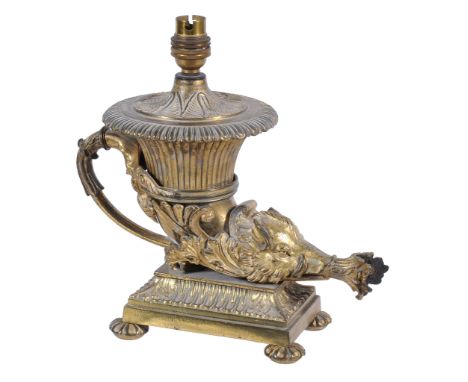  A George IV gilt metal table Rhyton oil lamp,   circa 1825, in the manner of Thomas Messenger,  with a boar's head terminal,