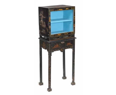  A Chinese black lacquer and gilt decorated display cabinet on stand  , 18th century and later,  with village scene decoratio