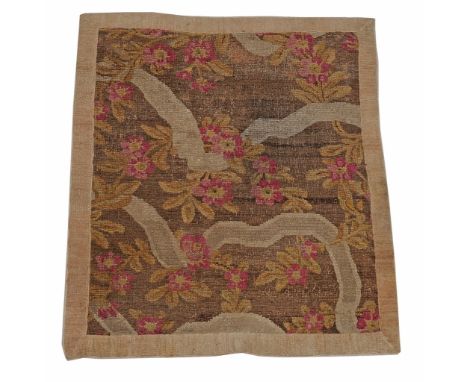  A Savonnerie rug fragment,   circa 1820,  the olive green field with horizontal boughs issuing flowers and foliage within a 