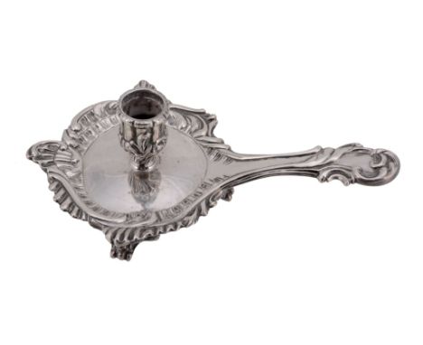  A George IV cast silver chamber candlestick by Charles Price,   London 1828, the lobed capital with a foliate base, the shap