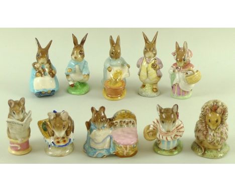 A collection of Beswick Beatrix Potter figurines, comprising 'Hunca Munca', 'Cecily Parsley', 'Mrs Tittlemouse', 'Mrs Rabbit'