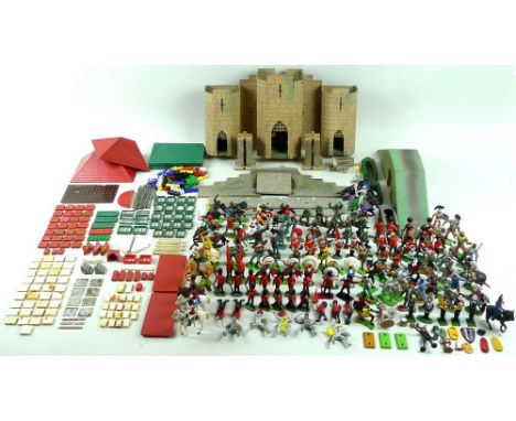 A likely handmade model of a medieval castle with functioning drawbridge, 42 by 32 by 22cm, together with a large collection 