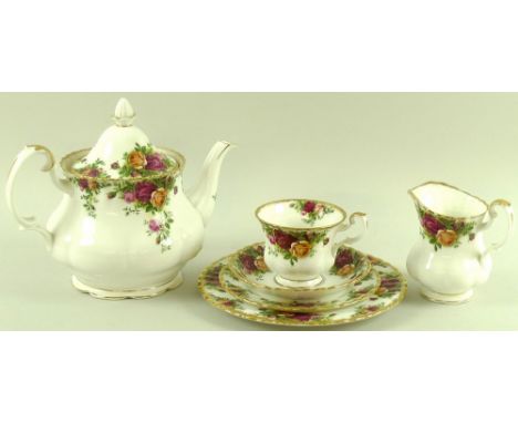 A Royal Albert part dinner service, decorated in the Old Country Roses pattern, comprising teapot, 19cm, cafetiere coffee pot