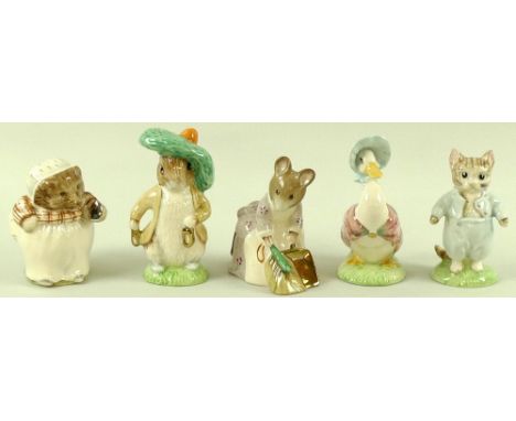 A collection of Beswick Beatrix Potter figurines, comprising 'Mr. Tod' with BP-4 backstamp, 'Peter Rabbit', 'Hunca Munca Swee